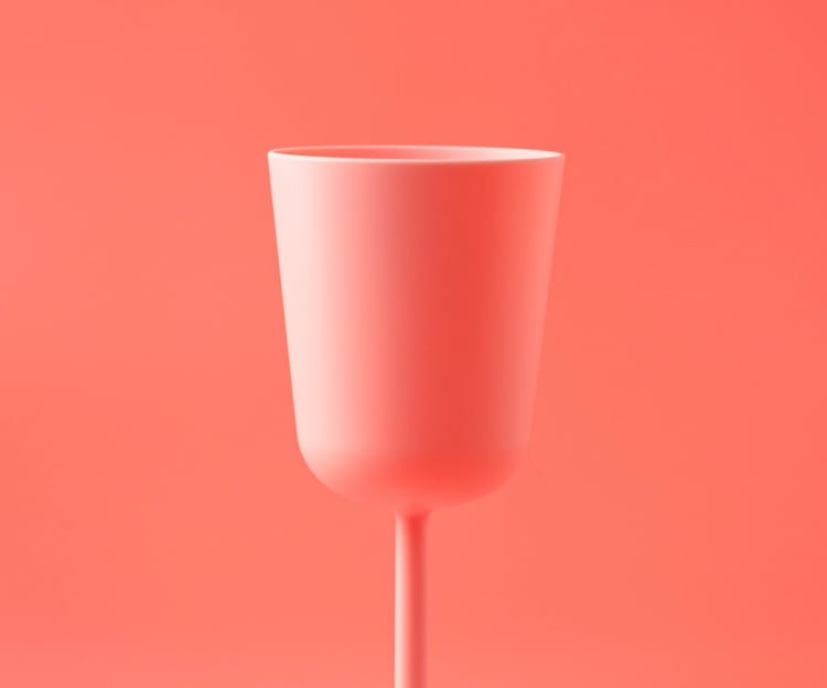 a bright pink cup on a vibrant pink background